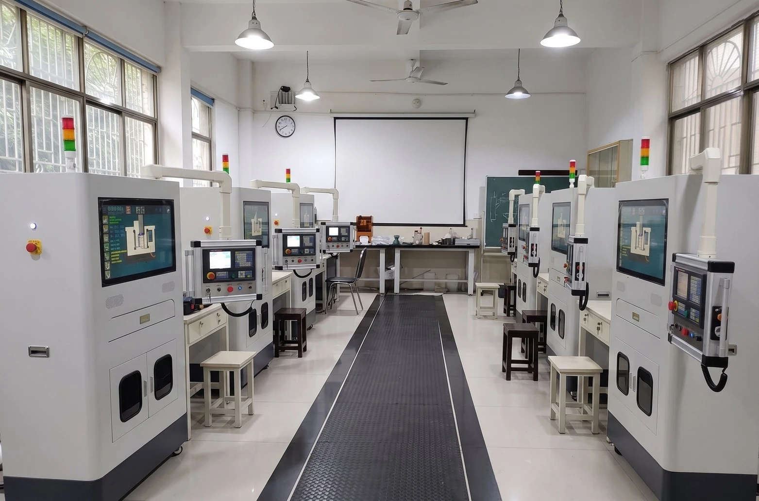 Hybrid CNC training stations arranged in a classroom laboratory